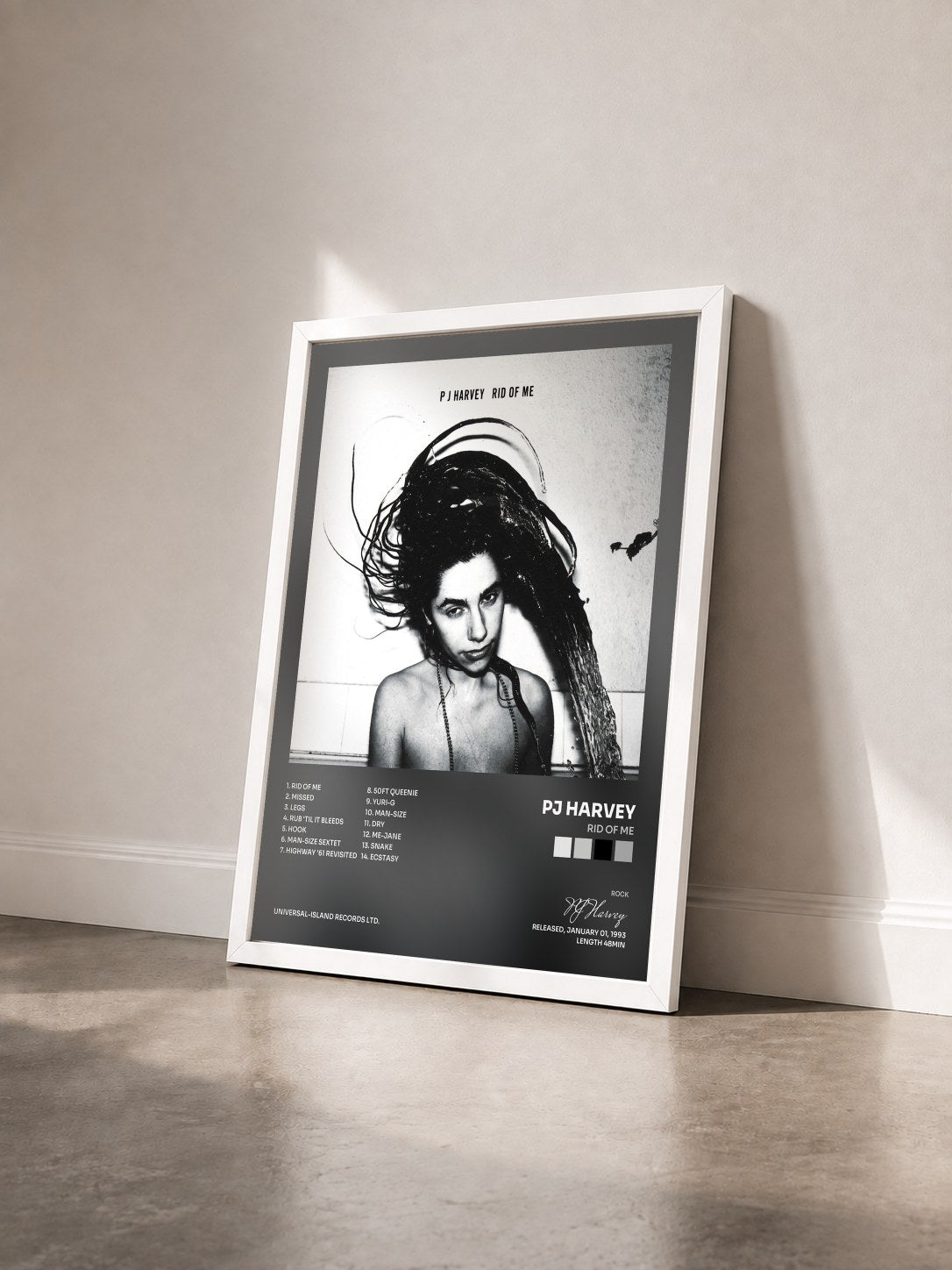 #blanc Tableau de l'album Rid Of Me de PJ Harvey vu de trois quarts, cadre blanc