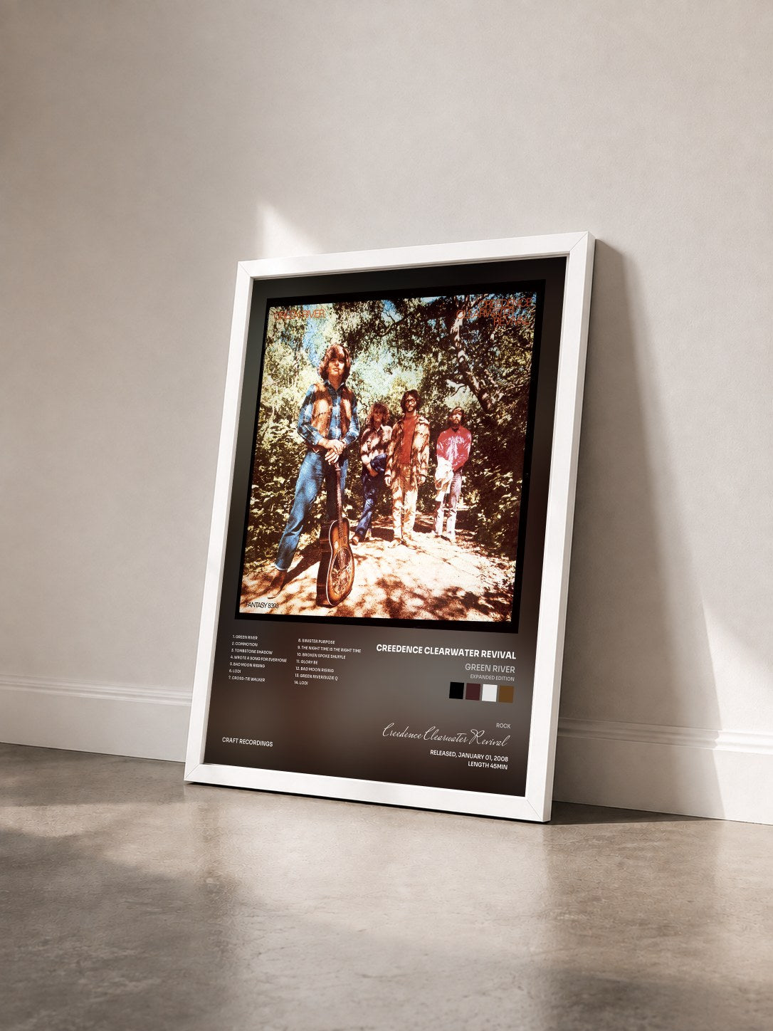#blanc Green River (Expanded Edition) by Creedence Clearwater Revival as a framed art print seen at an angle, white frame