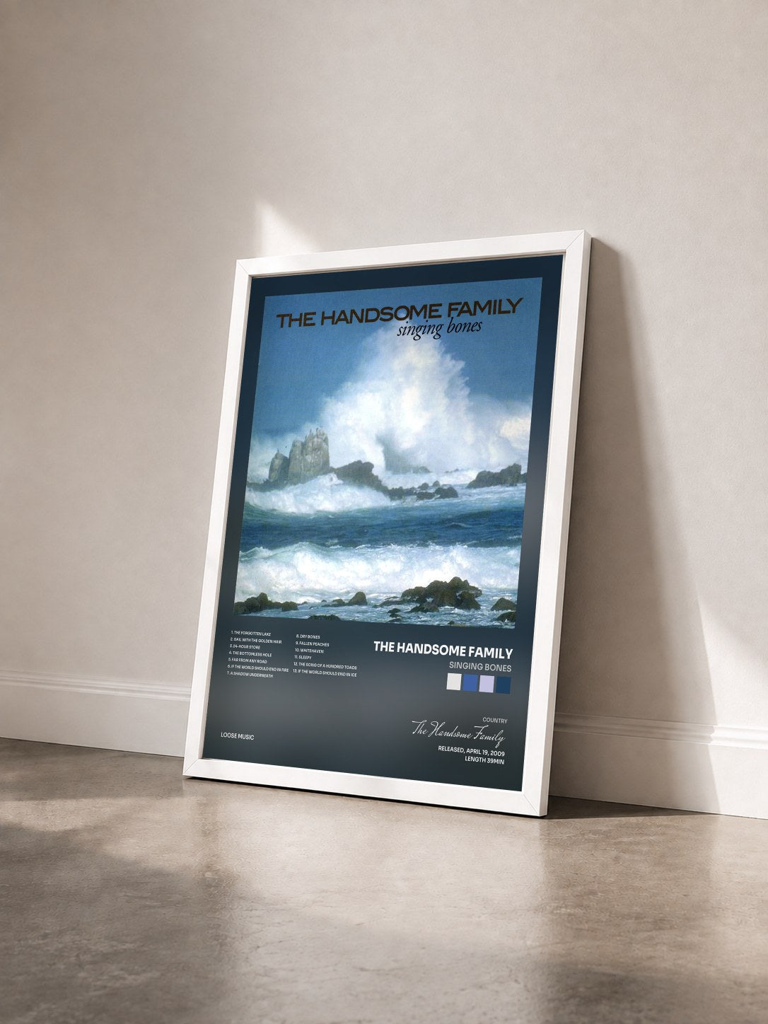 #blanc Tableau de l'album Singing Bones de The Handsome Family vu de trois quarts, cadre blanc