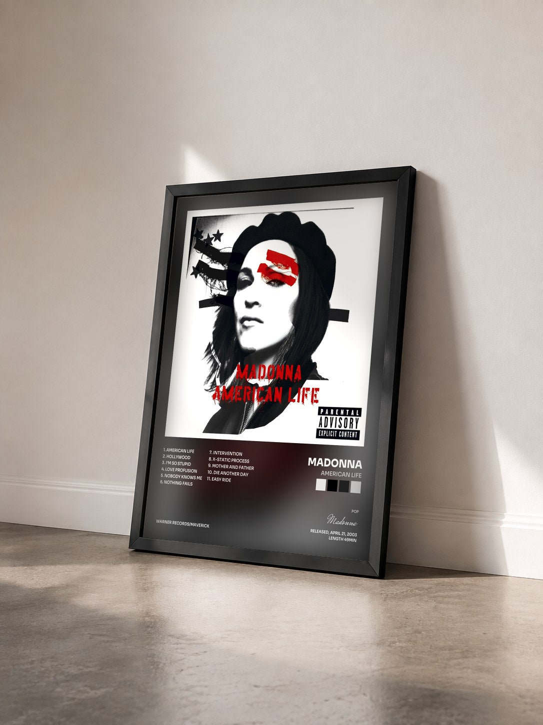 #noir Tableau de l'album American Life de Madonna vu de trois quarts, cadre noir