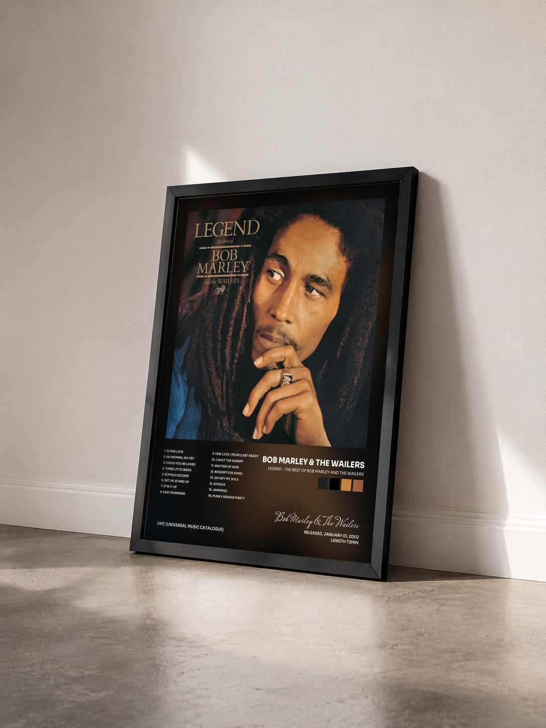 #noir Tableau de l'album Legend - The Best Of Bob Marley And The Wailers de Bob Marley & The Wailers vu de trois quarts, cadre noir
