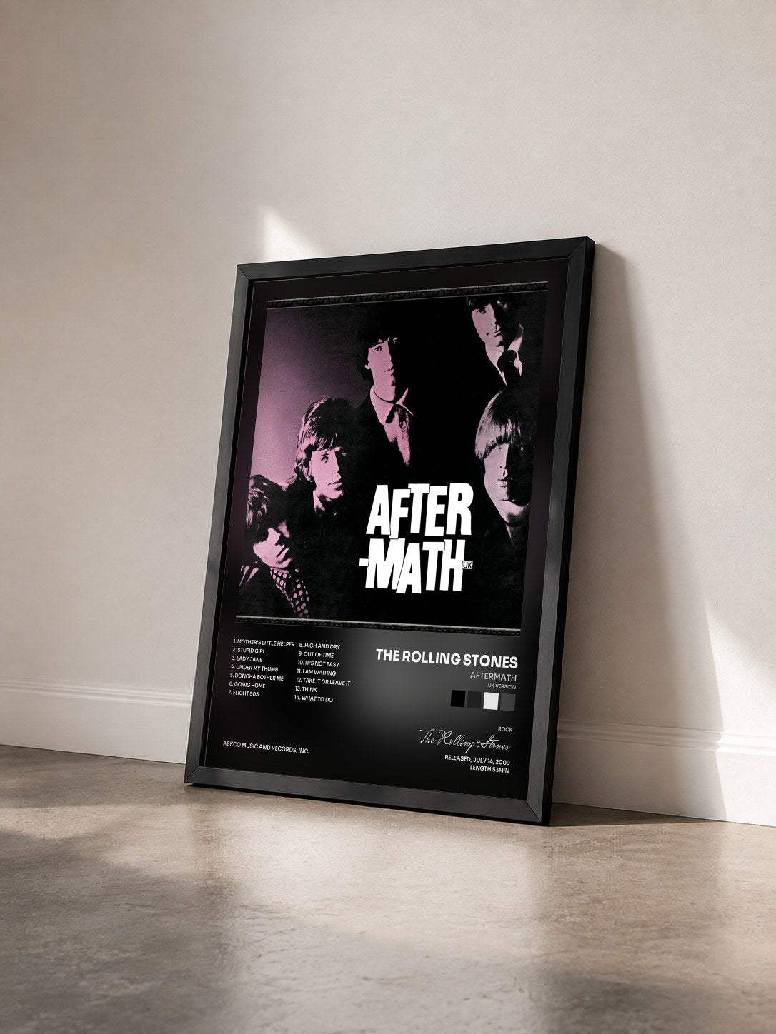 #noir Tableau de l'album Aftermath (UK Version) de The Rolling Stones vu de trois quarts, cadre noir