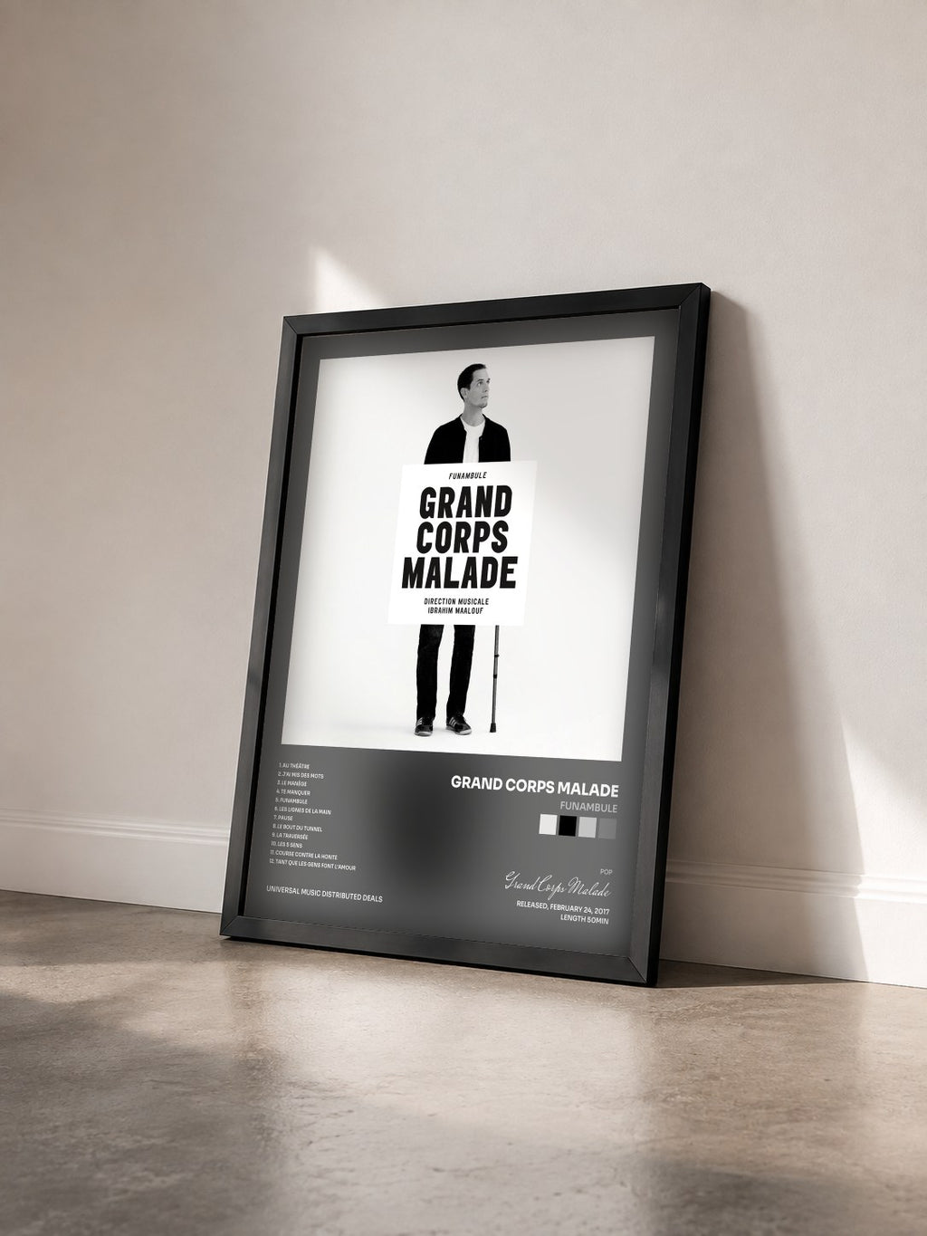 #noir Tableau de l'album Funambule de Grand Corps Malade vu de trois quarts, cadre noir