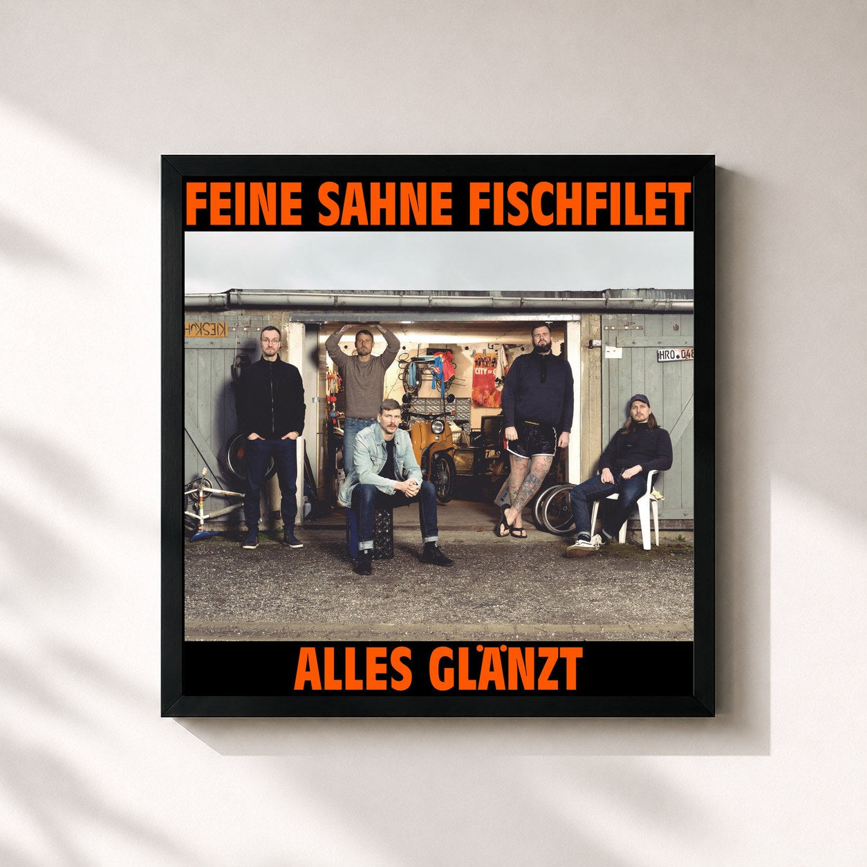 #noir Tableau carré de l'album Alles glänzt de Feine Sahne Fischfilet, cadre noir 32x32 cm