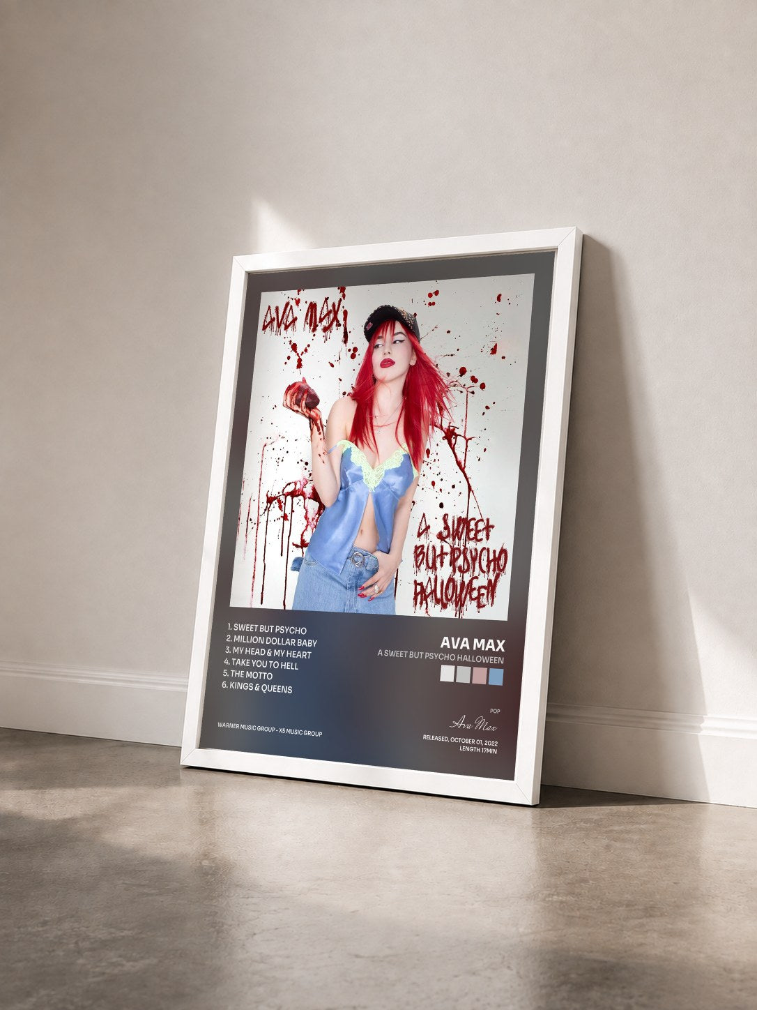 #blanc A Sweet but Psycho Halloween by Ava Max as a framed art print seen at an angle, white frame