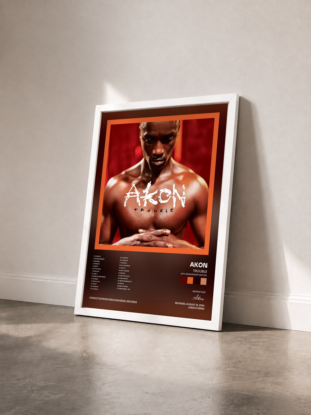 #blanc Trouble (20th Anniversary Edition) by Akon as a framed art print seen at an angle, white frame