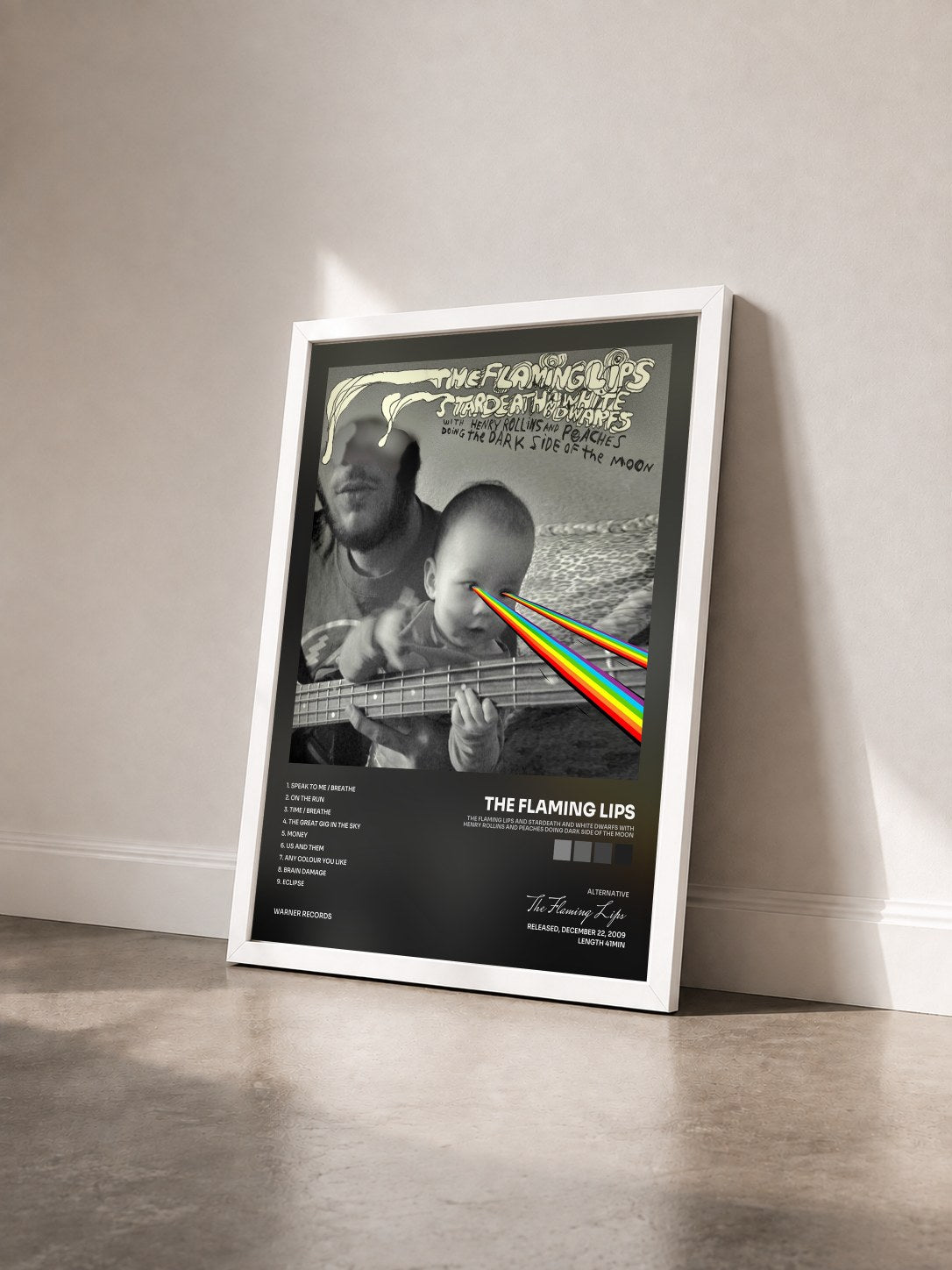 #blanc Tableau de l'album The Flaming Lips And Stardeath And White Dwarfs With Henry Rollins And Peaches Doing Dark Side Of The Moon de The Flaming Lips vu de trois quarts, cadre blanc