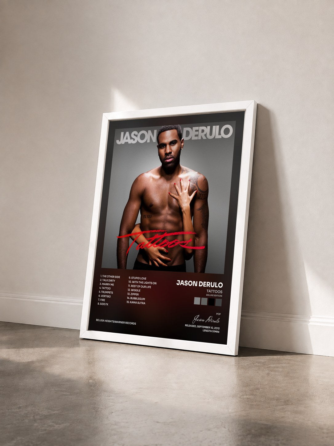 #blanc Tattoos (Deluxe Edition) by Jason Derulo as a framed art print seen at an angle, white frame