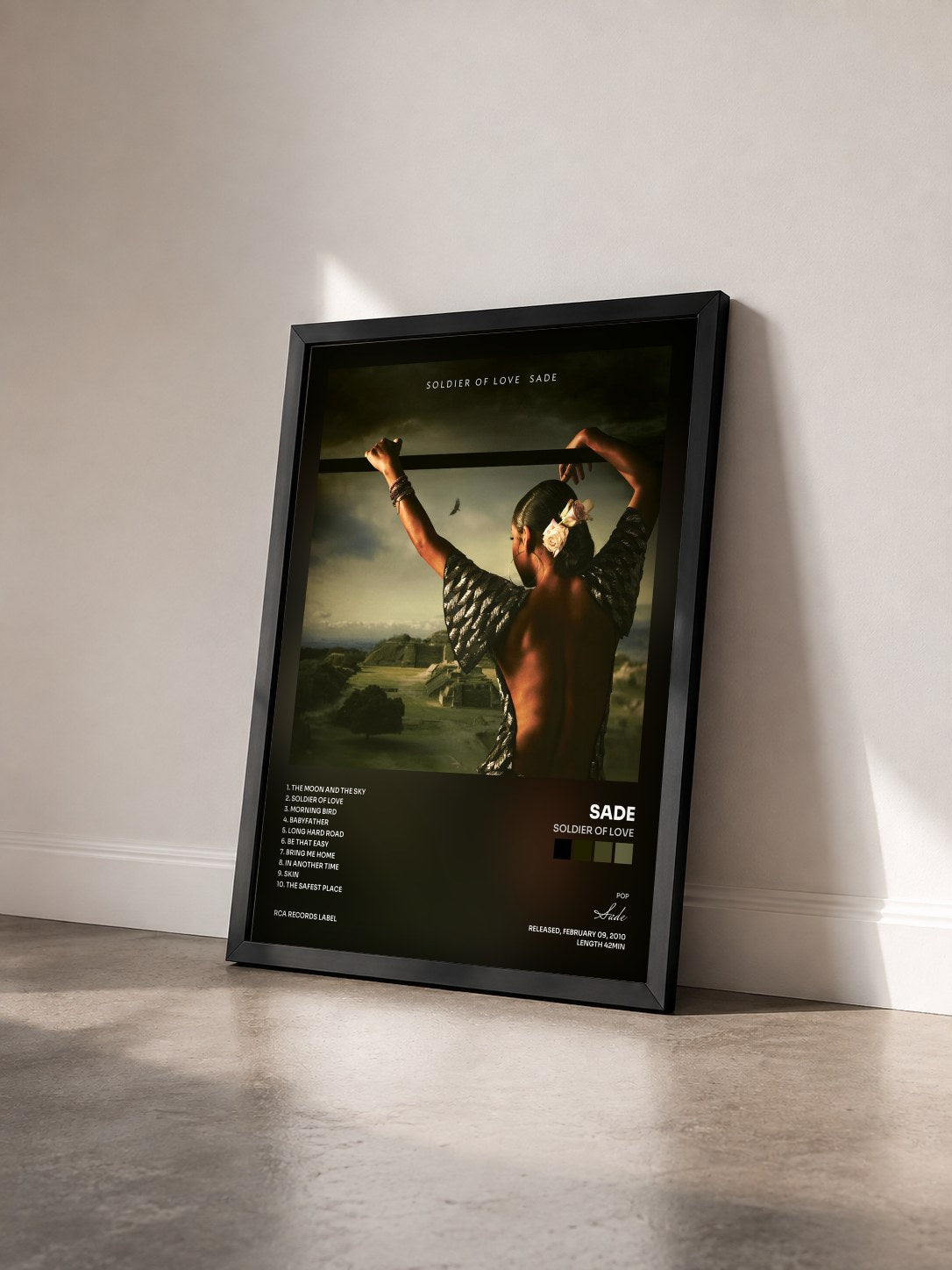 #noir Soldier of Love by Sade as a framed art print seen at an angle, black frame