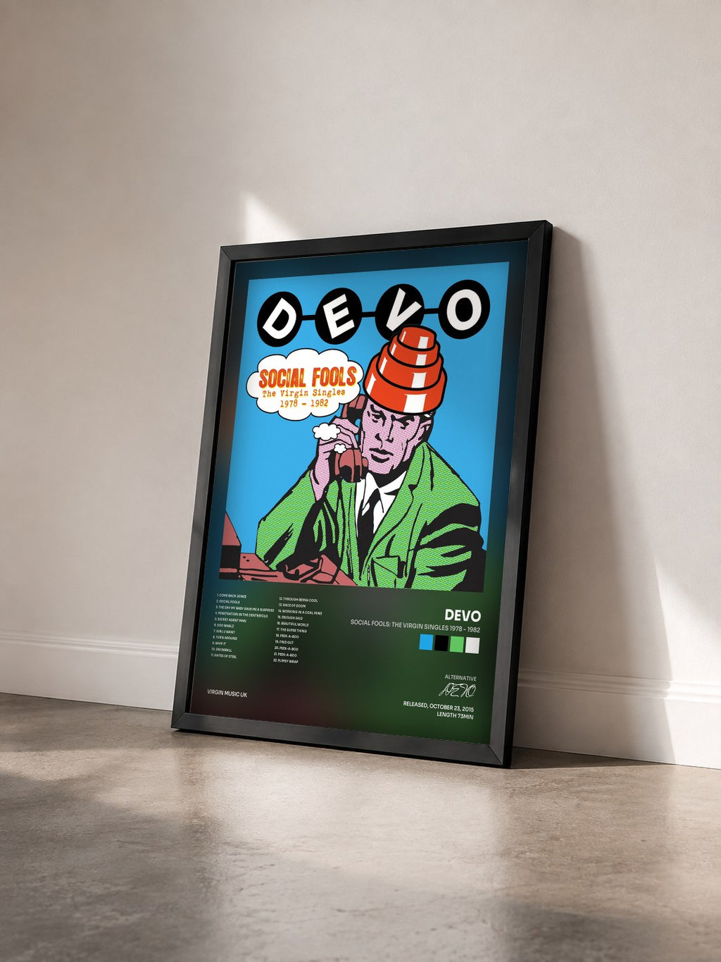 #noir Tableau de l'album Social Fools: The Virgin Singles 1978 - 1982 de DEVO vu de trois quarts, cadre noir