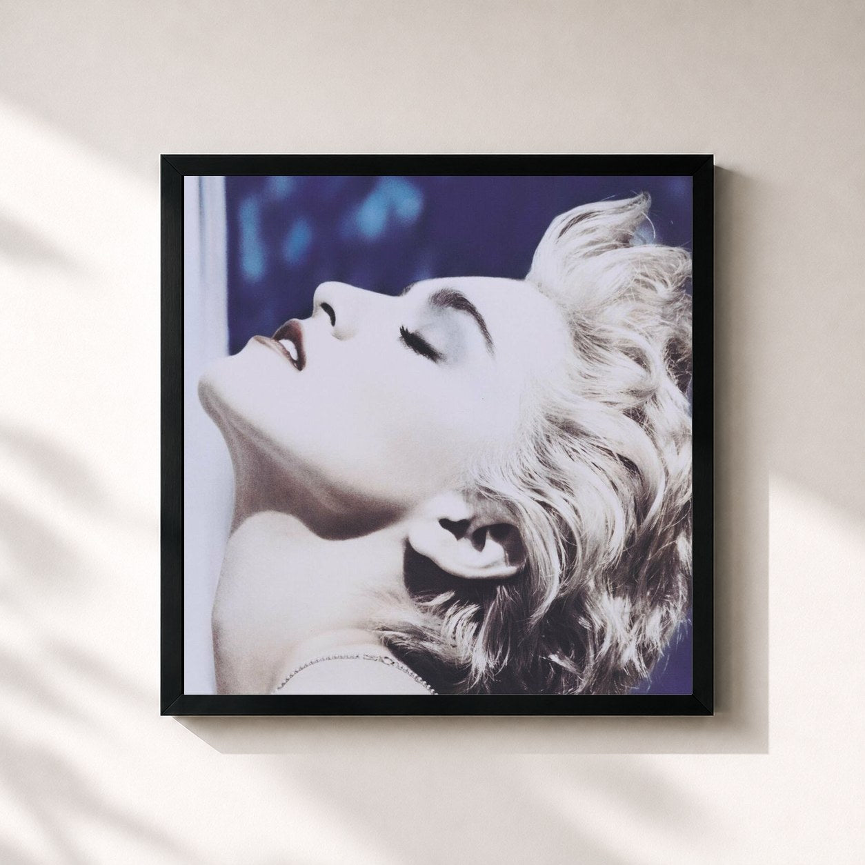 #noir True Blue by Madonna as a square framed art print, black 32x32 cm frame