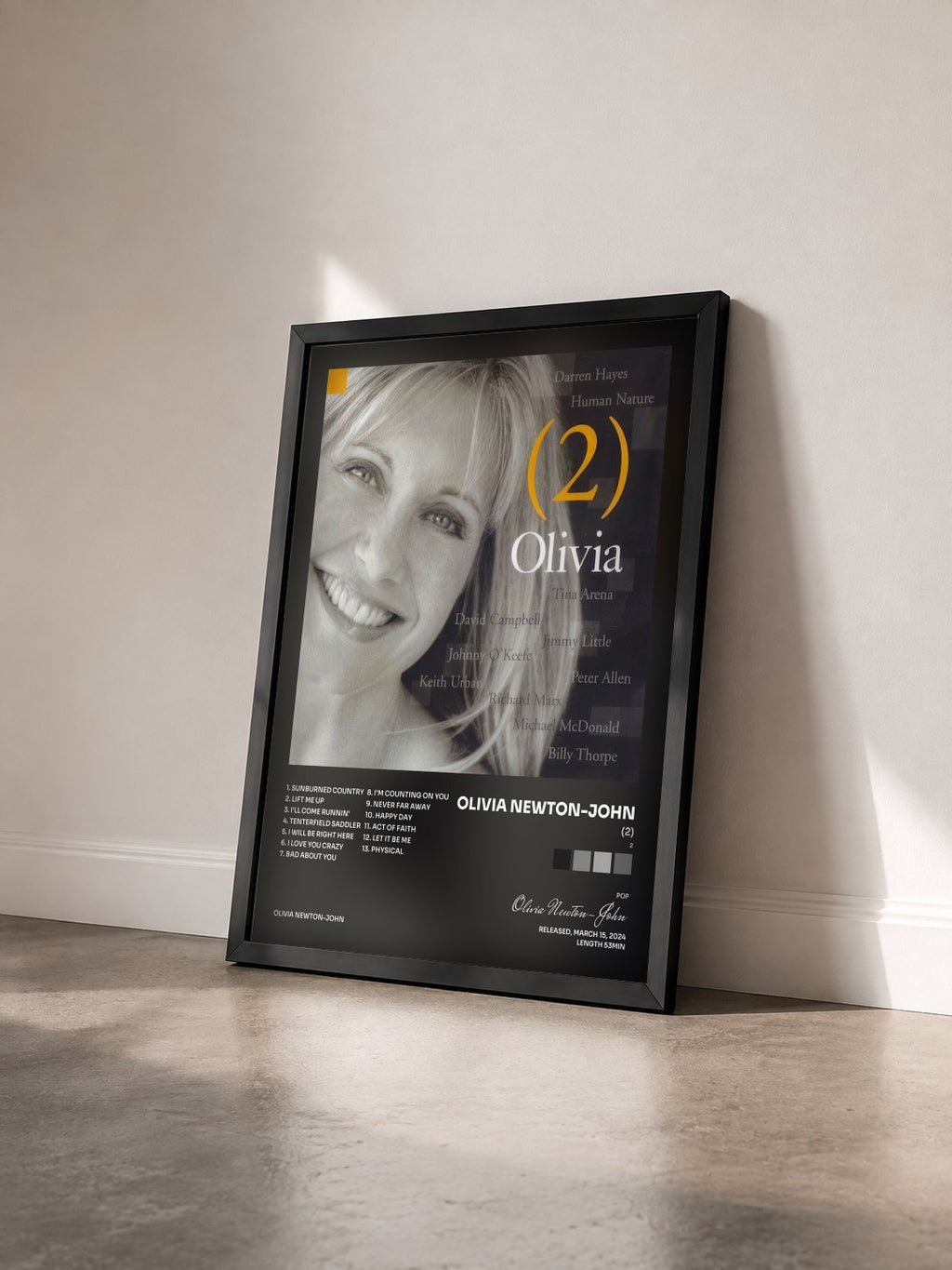 #noir Tableau de l'album (2) de Olivia Newton-John vu de trois quarts, cadre noir
