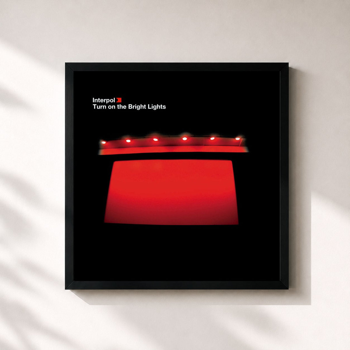 #noir Tableau carré de l'album Turn On The Bright Lights de Interpol, cadre noir 32x32 cm