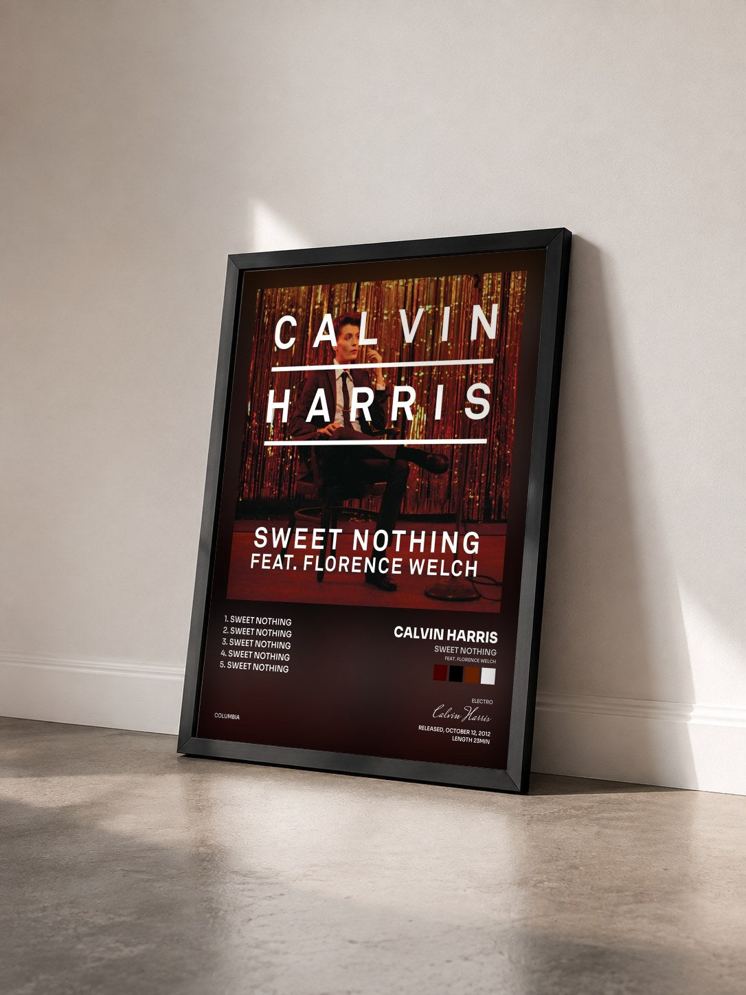 #noir Tableau de l'album Sweet Nothing (feat. Florence Welch) de Calvin Harris vu de trois quarts, cadre noir