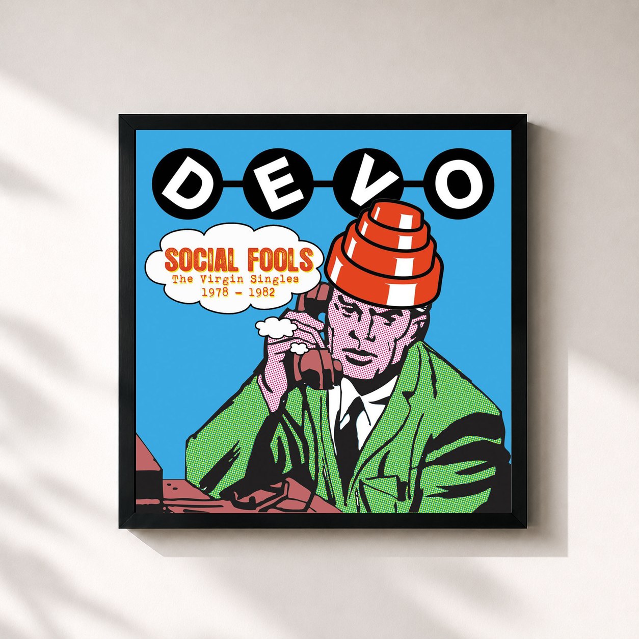 #noir Tableau carré de l'album Social Fools: The Virgin Singles 1978 - 1982 de DEVO, cadre noir 32x32 cm