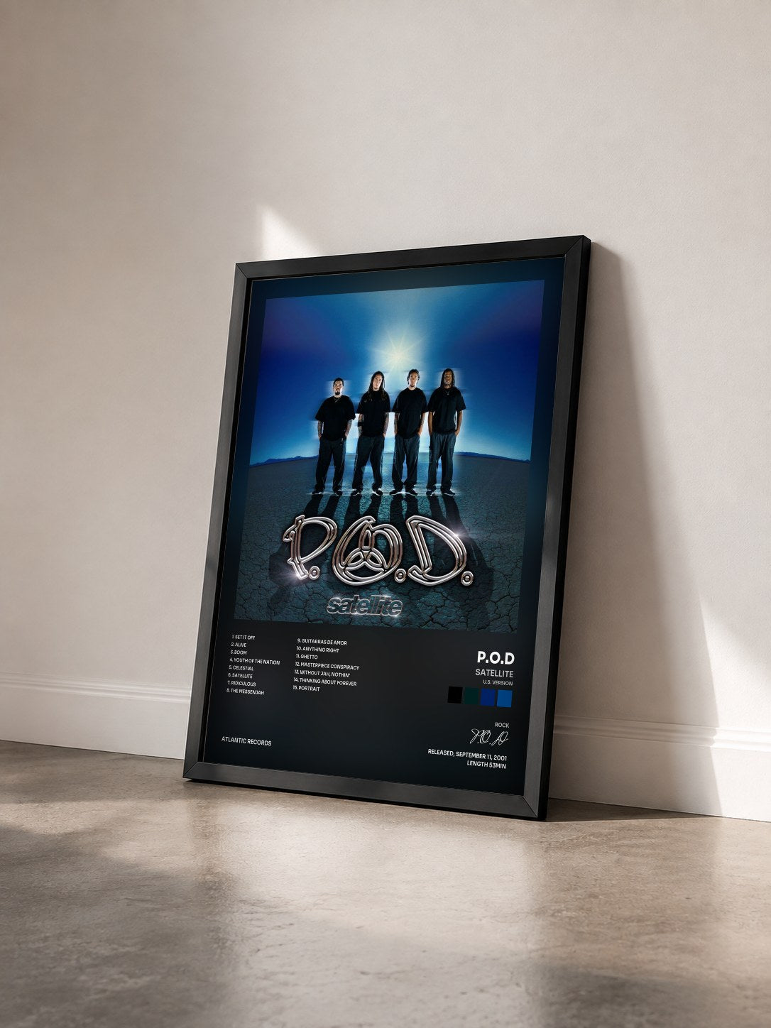 #noir Tableau de l'album Satellite (U.S. Version) de P.O.D vu de trois quarts, cadre noir