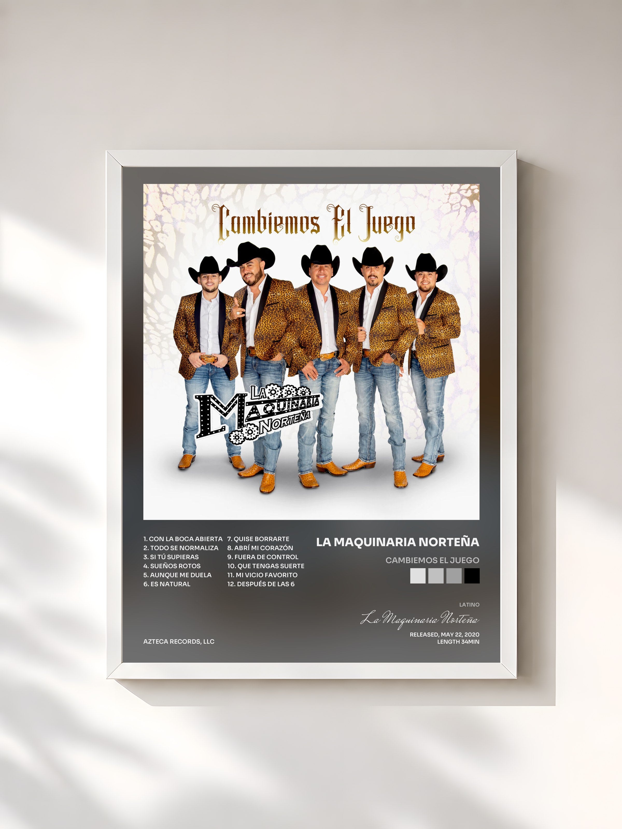 #blanc Tableau de l'album Cambiemos el Juego de La Maquinaria Norteña, cadre blanc, imprimé et encadré en France