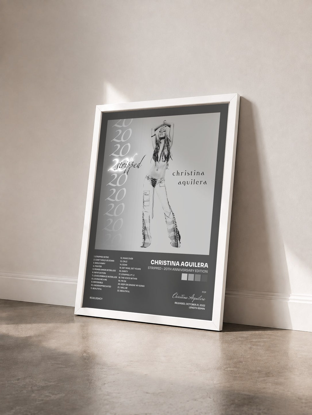#blanc Tableau de l'album Stripped - 20th Anniversary Edition de Christina Aguilera vu de trois quarts, cadre blanc