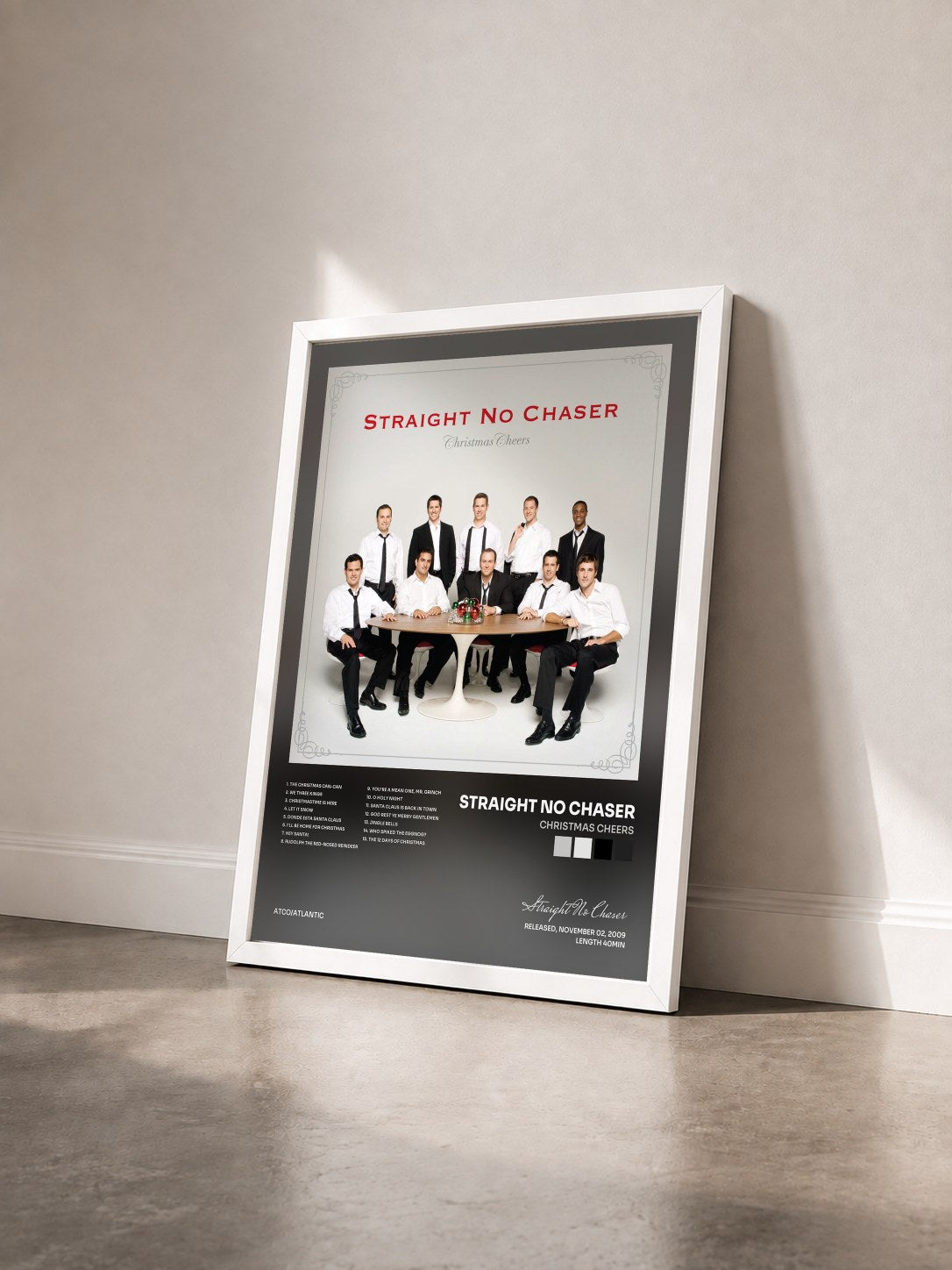 #blanc Tableau de l'album Christmas Cheers de Straight No Chaser vu de trois quarts, cadre blanc