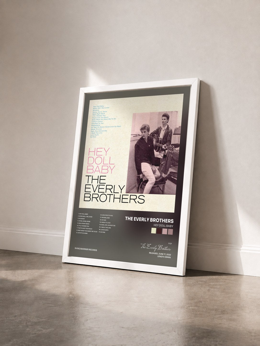 #blanc Tableau de l'album Hey Doll Baby de The Everly Brothers vu de trois quarts, cadre blanc