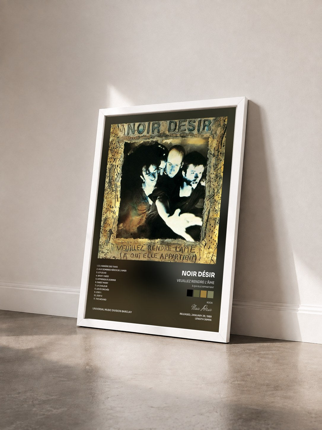 #blanc Tableau de l'album Veuillez rendre l'âme (à qui elle appartient) de Noir Désir vu de trois quarts, cadre blanc