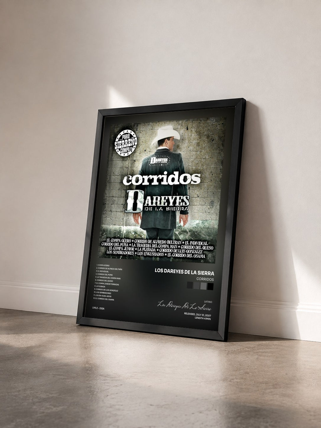 #noir Tableau de l'album Corridos de Los Dareyes De La Sierra vu de trois quarts, cadre noir
