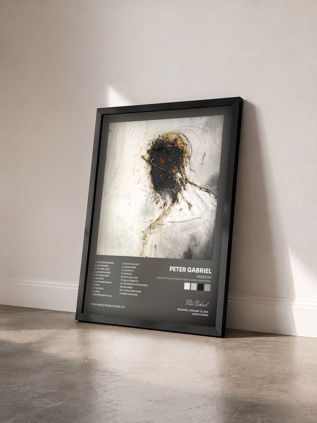 #noir Tableau de l'album Passion (Music For The Last Temptation Of Christ / Remastered) de Peter Gabriel vu de trois quarts, cadre noir