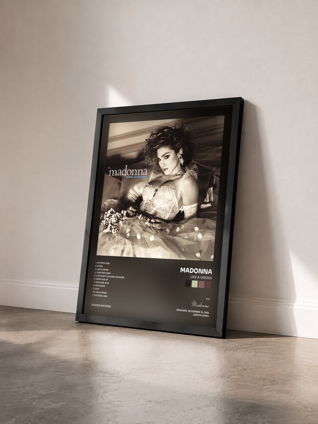 #noir Like a Virgin by Madonna as a framed art print seen at an angle, black frame