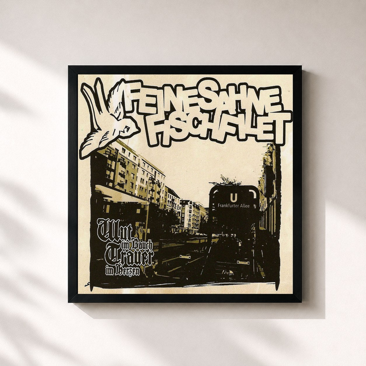 #noir Tableau carré de l'album Wut im Bauch Trauer im Herzen de Feine Sahne Fischfilet, cadre noir 32x32 cm