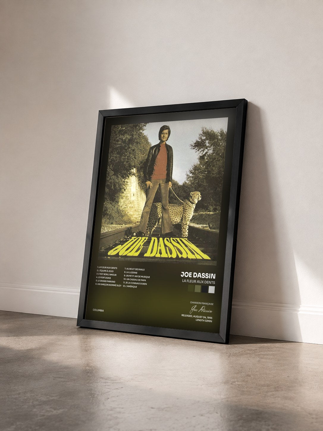 #noir La Fleur Aux Dents by Joe Dassin as a framed art print seen at an angle, black frame