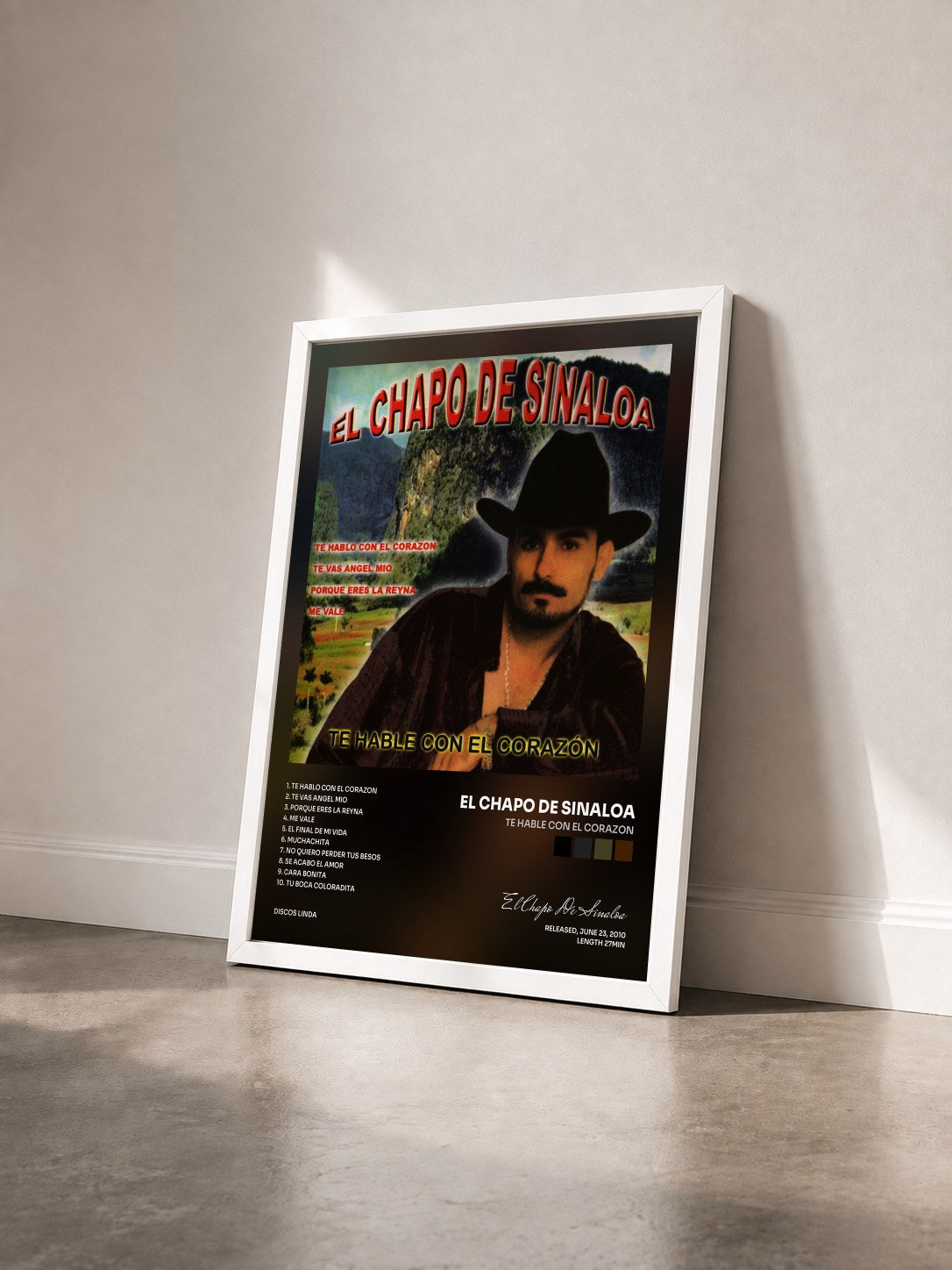 #blanc Tableau de l'album Te Hable con El Corazon de El Chapo De Sinaloa vu de trois quarts, cadre blanc