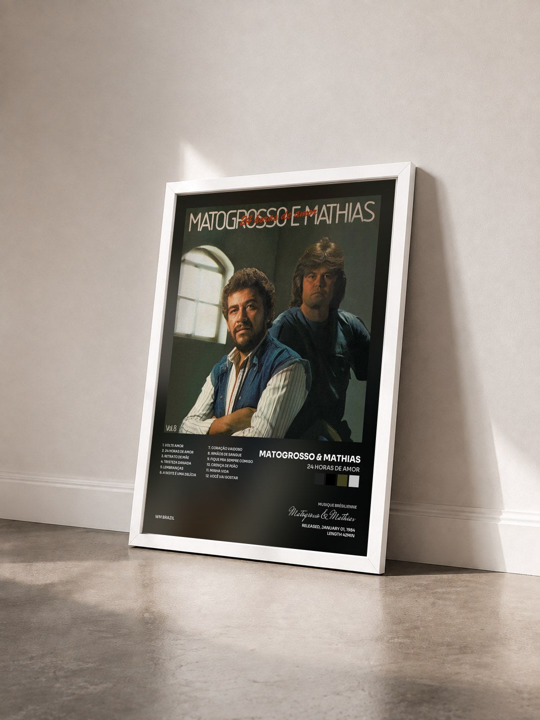 #blanc Tableau de l'album 24 Horas de Amor de Matogrosso & Mathias vu de trois quarts, cadre blanc