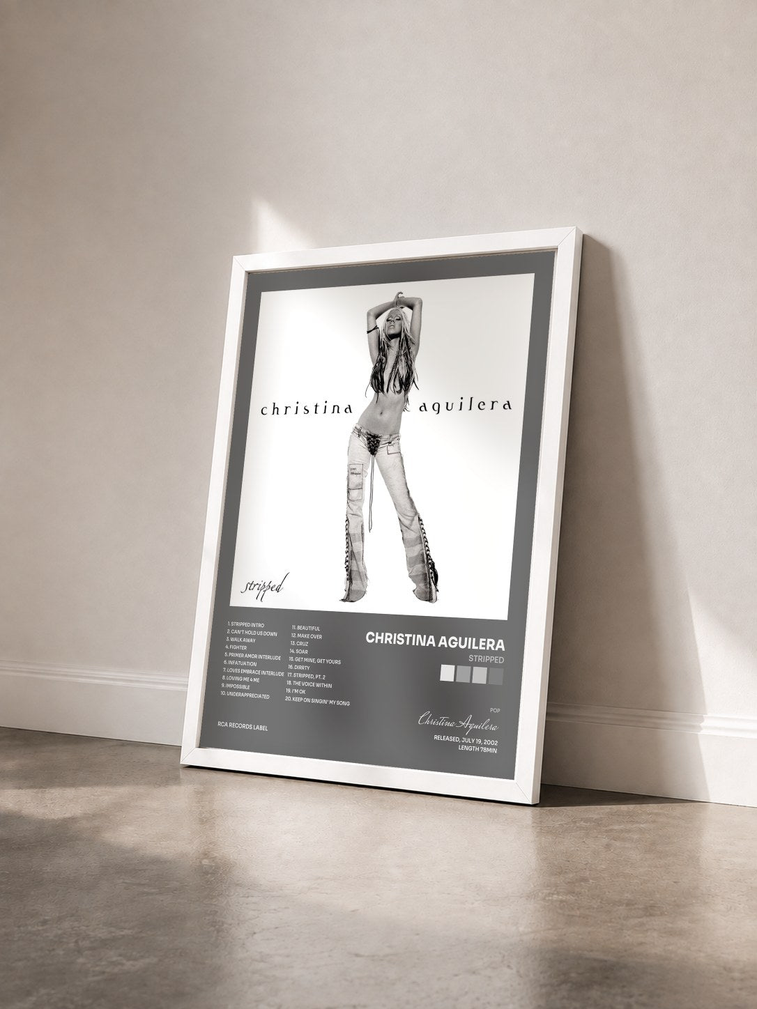 #blanc Tableau de l'album Stripped de Christina Aguilera vu de trois quarts, cadre blanc