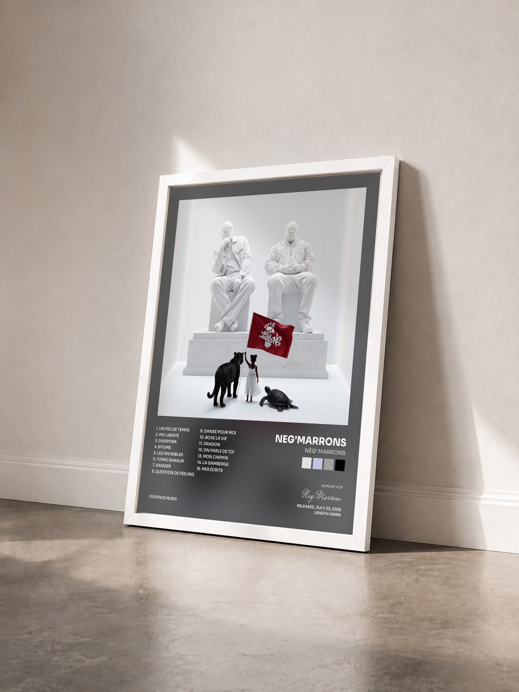 #blanc Nèg' Marrons by Neg'Marrons as a framed art print seen at an angle, white frame