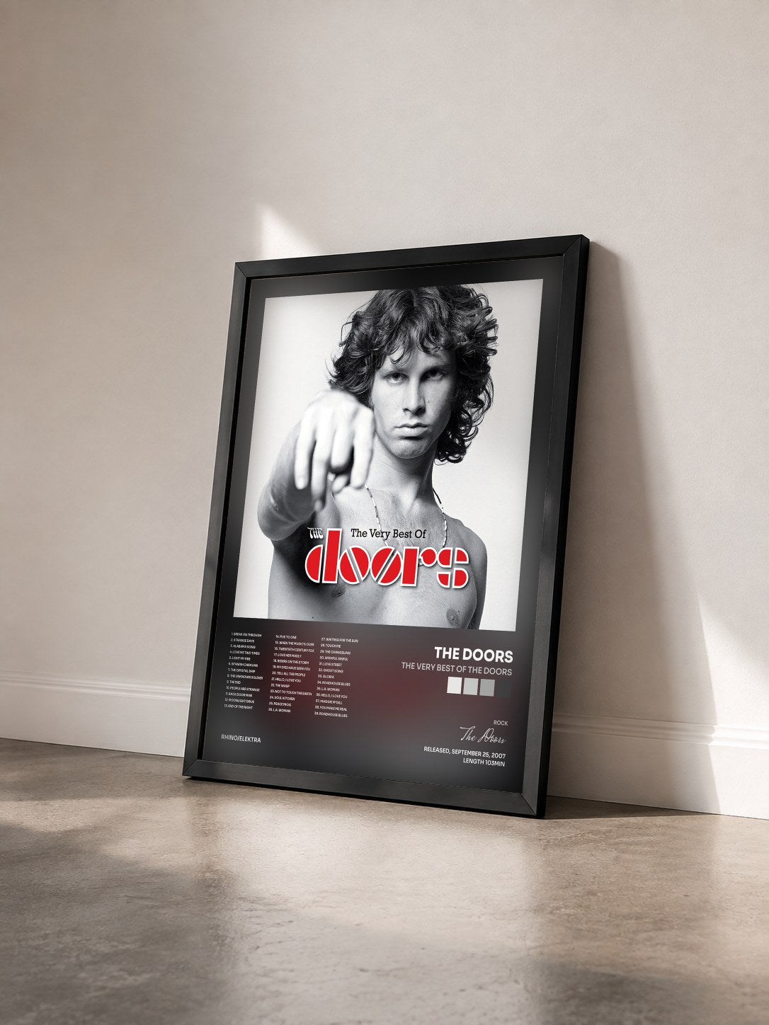 #noir Tableau de l'album The Very Best of the Doors de The Doors vu de trois quarts, cadre noir