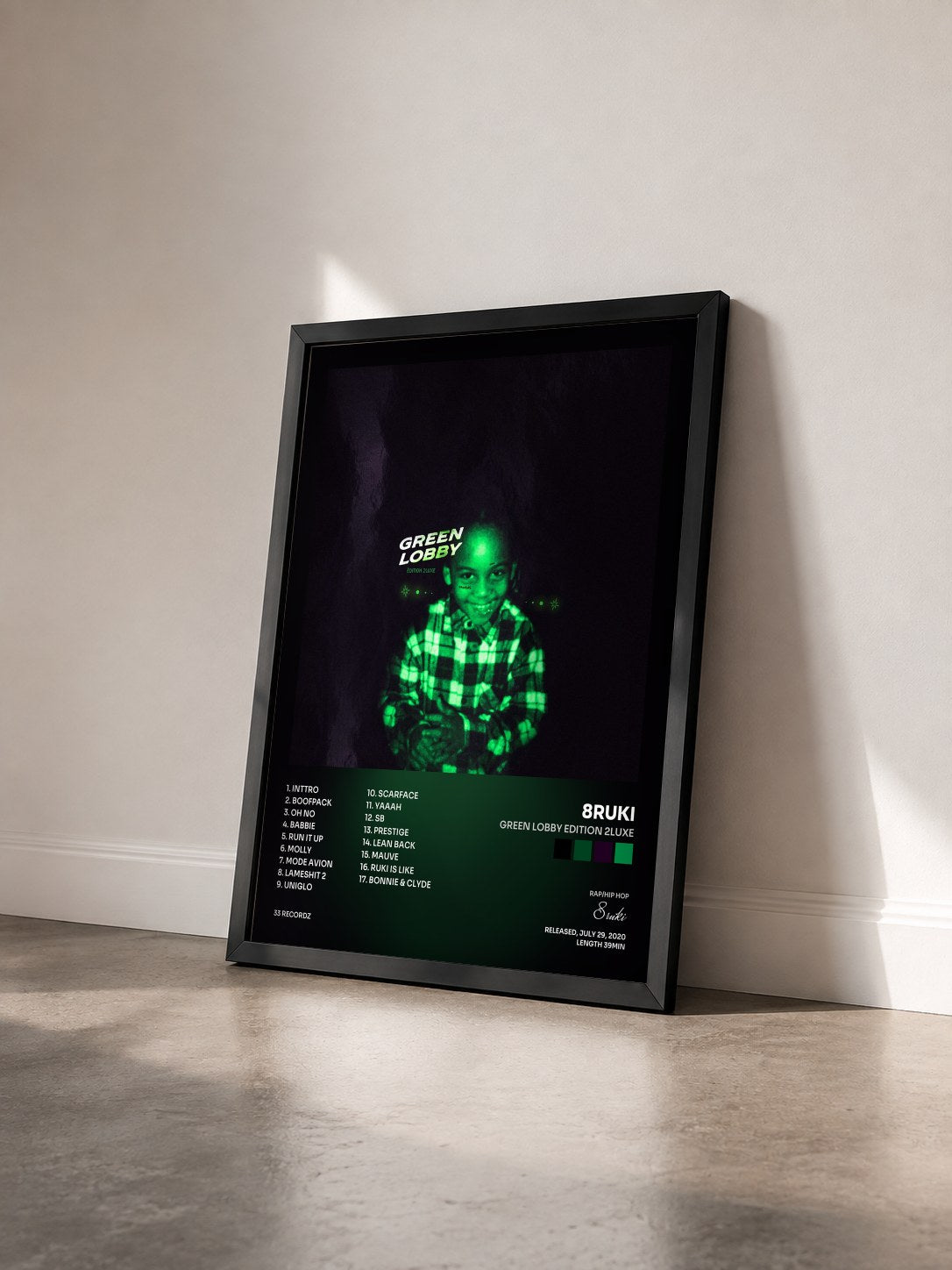 #noir Tableau de l'album Green Lobby Edition 2Luxe de 8ruki vu de trois quarts, cadre noir