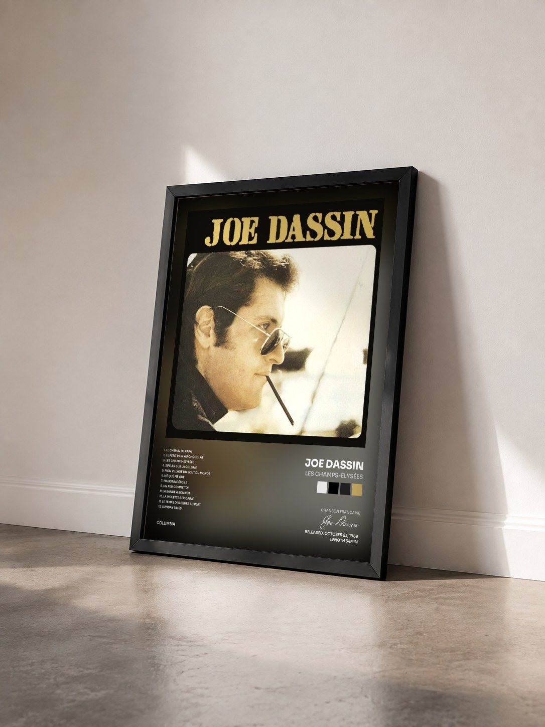 #noir Les Champs-Elysées by Joe Dassin as a framed art print seen at an angle, black frame