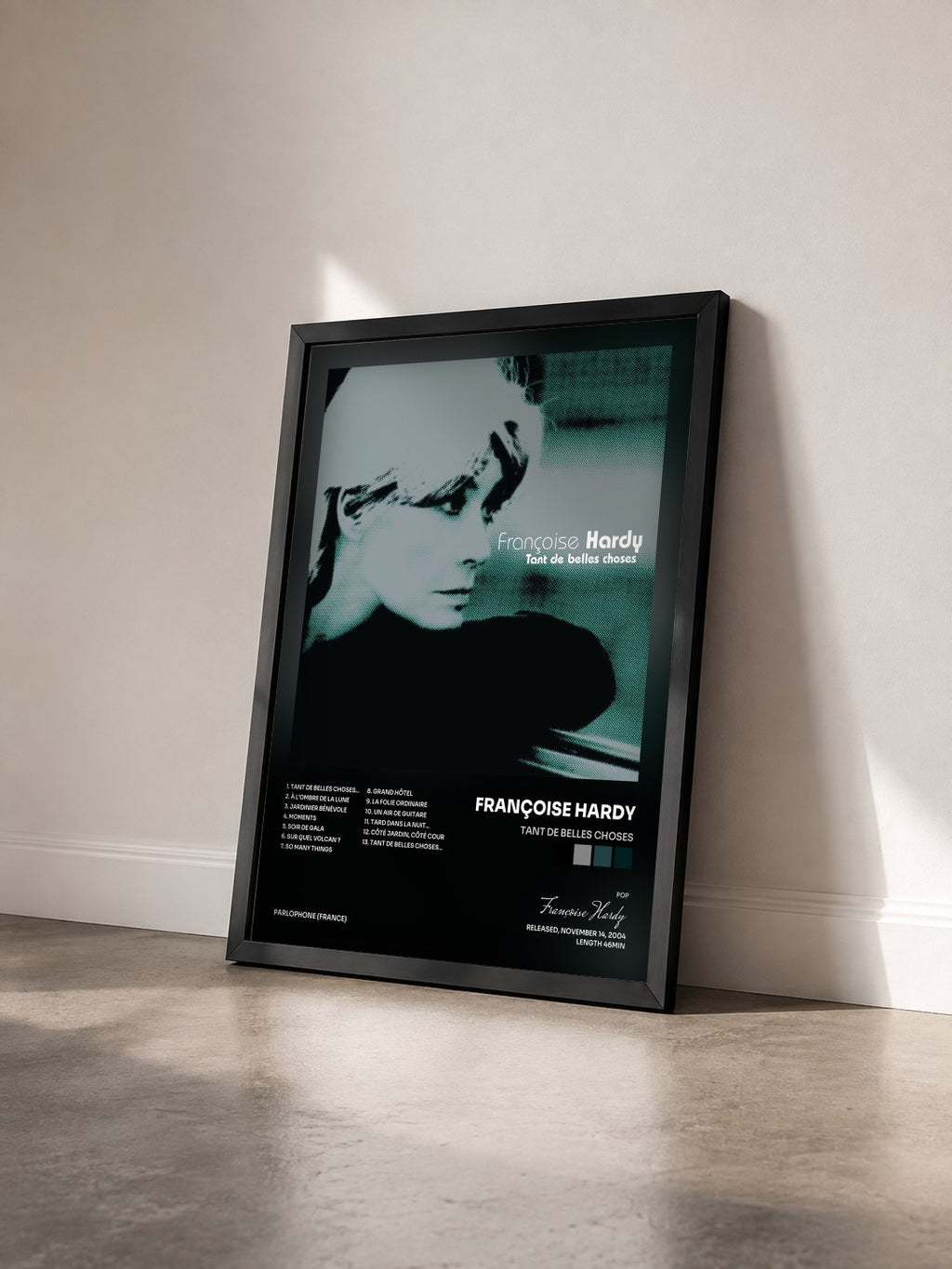 #noir Tant by belles choses de Françoise Hardy as a framed art print seen at an angle, black frame