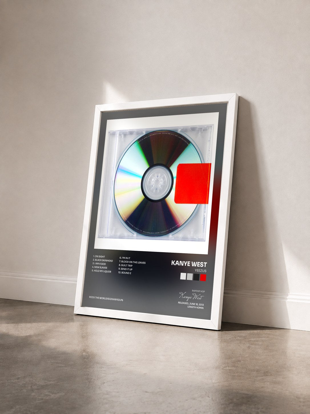 #blanc Tableau de l'album Yeezus de Kanye West vu de trois quarts, cadre blanc