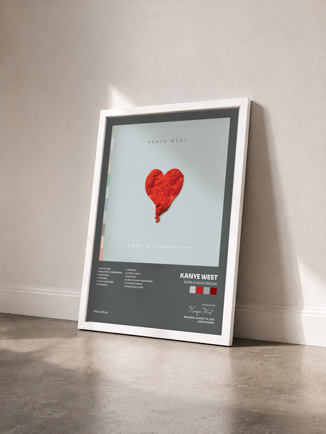 #blanc Tableau de l'album 808s & Heartbreak de Kanye West vu de trois quarts, cadre blanc