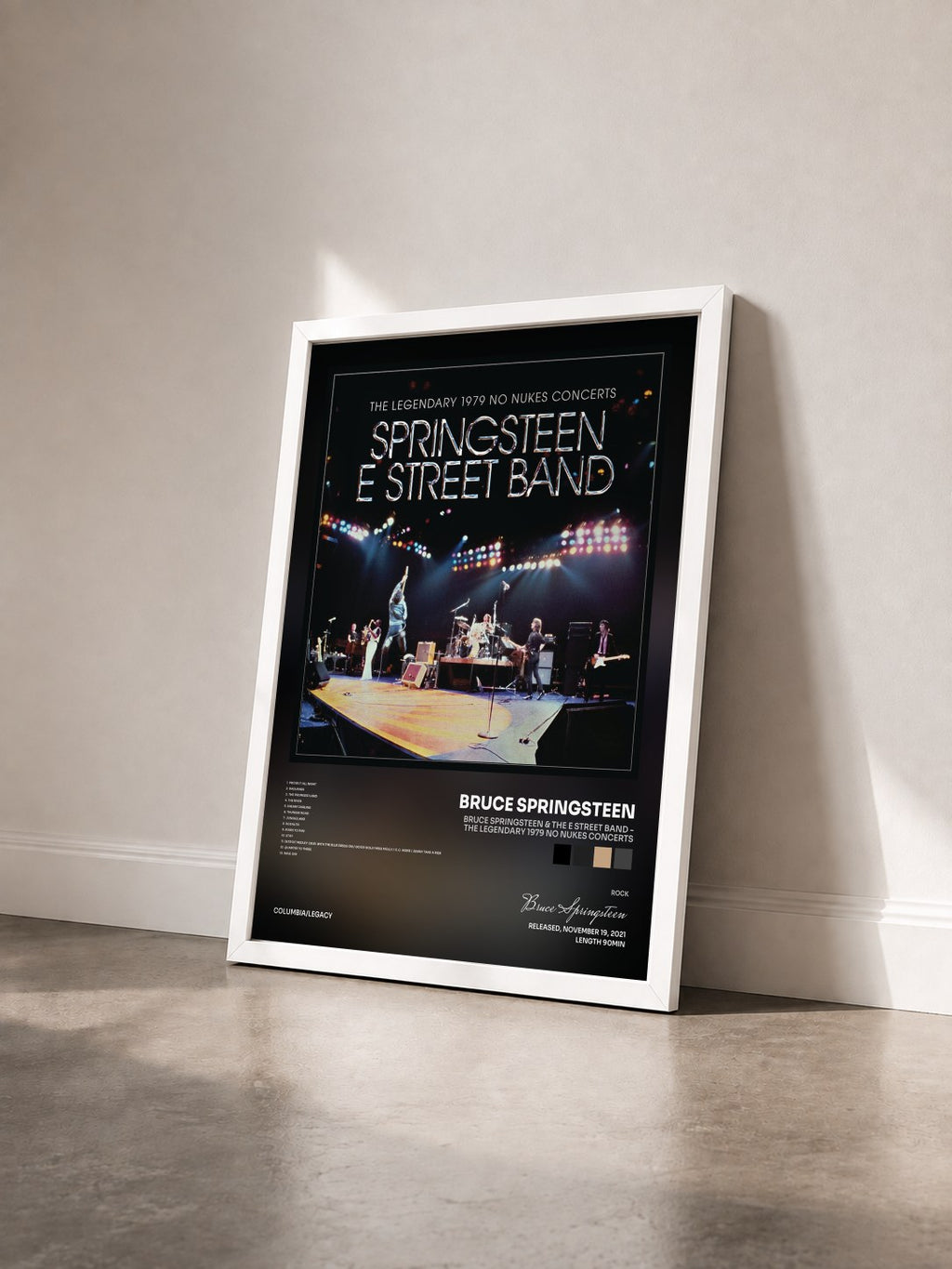 #blanc Bruce Springsteen & The E Street Band - The Legendary 1979 No Nukes Concerts by Bruce Springsteen as a framed art print seen at an angle, white frame
