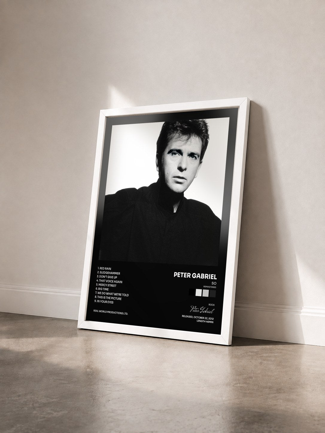 #blanc Tableau de l'album So (Remastered) de Peter Gabriel vu de trois quarts, cadre blanc