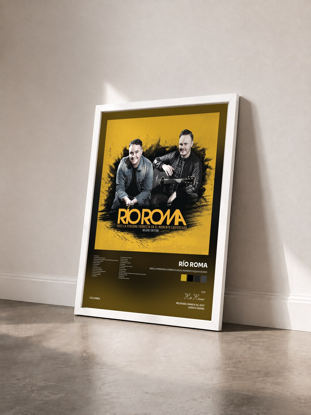 #blanc Tableau de l'album Eres la Persona Correcta en el Momento Equivocado de Río Roma vu de trois quarts, cadre blanc