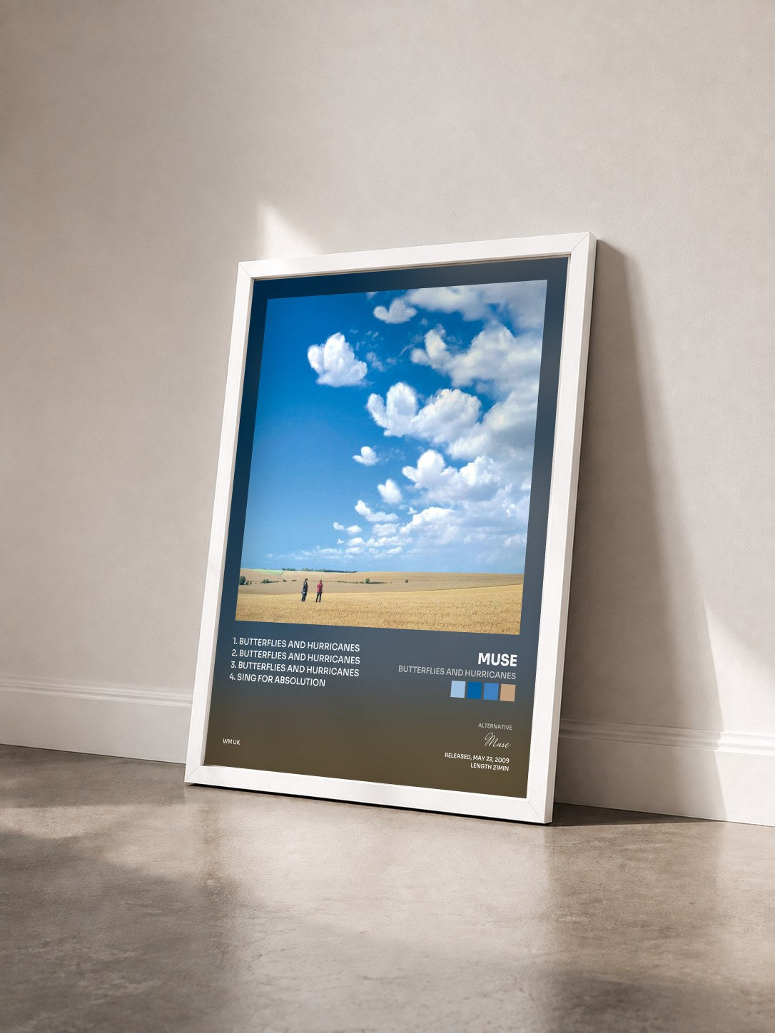 #blanc Tableau de l'album Butterflies and Hurricanes de Muse vu de trois quarts, cadre blanc