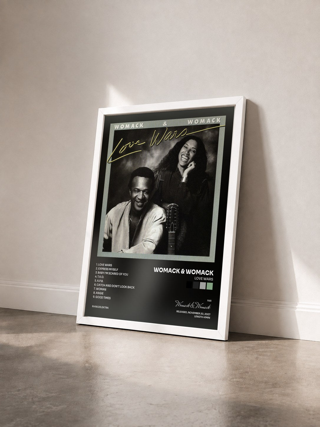 #blanc Tableau de l'album Love Wars de Womack & Womack vu de trois quarts, cadre blanc