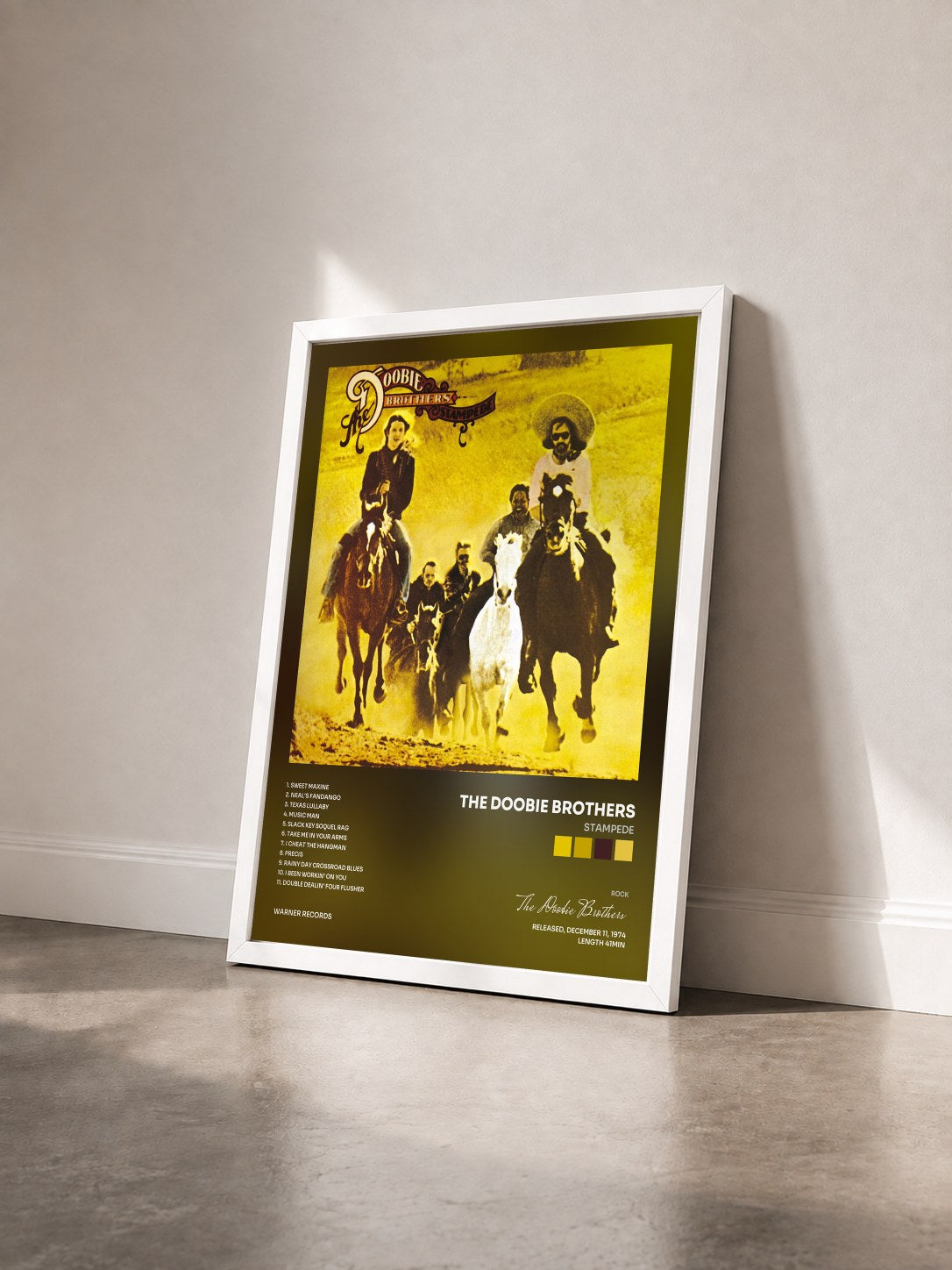 #blanc Tableau de l'album Stampede de The Doobie Brothers vu de trois quarts, cadre blanc