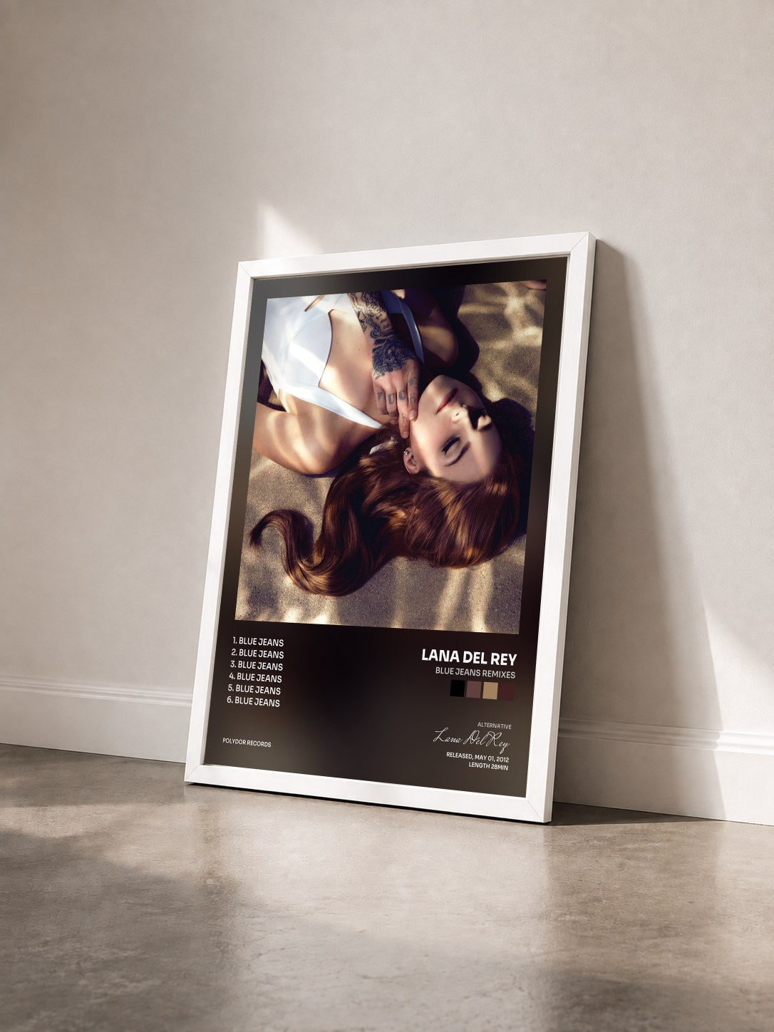 #blanc Tableau de l'album Blue Jeans Remixes de Lana Del Rey vu de trois quarts, cadre blanc