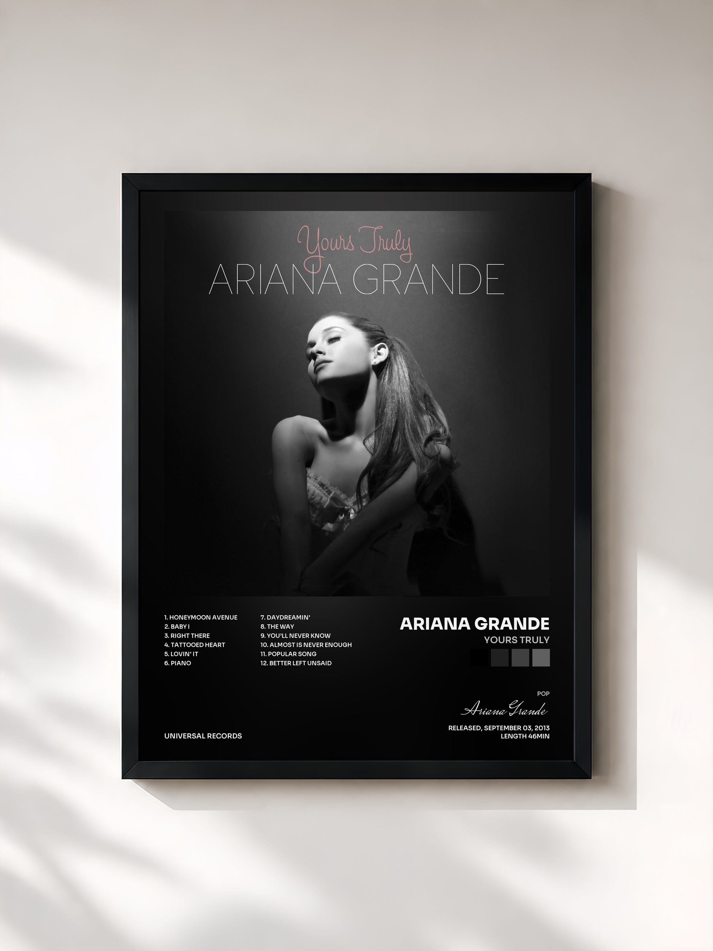 #noir Yours Truly by Ariana Grande as a framed art print, black frame, printed and framed in France