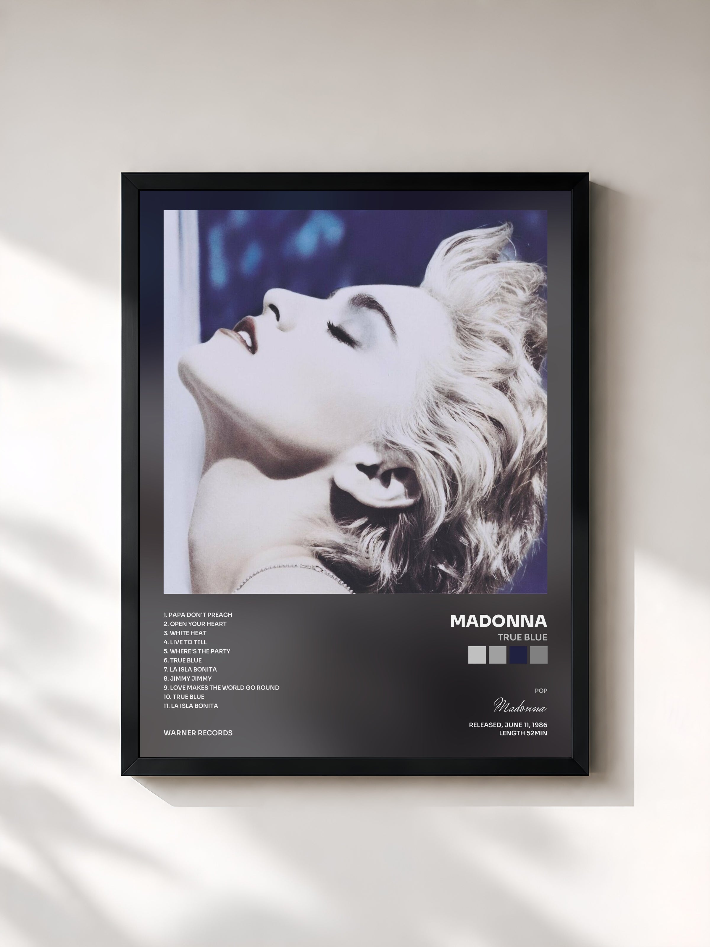 #noir True Blue by Madonna as a framed art print, black frame, printed and framed in France