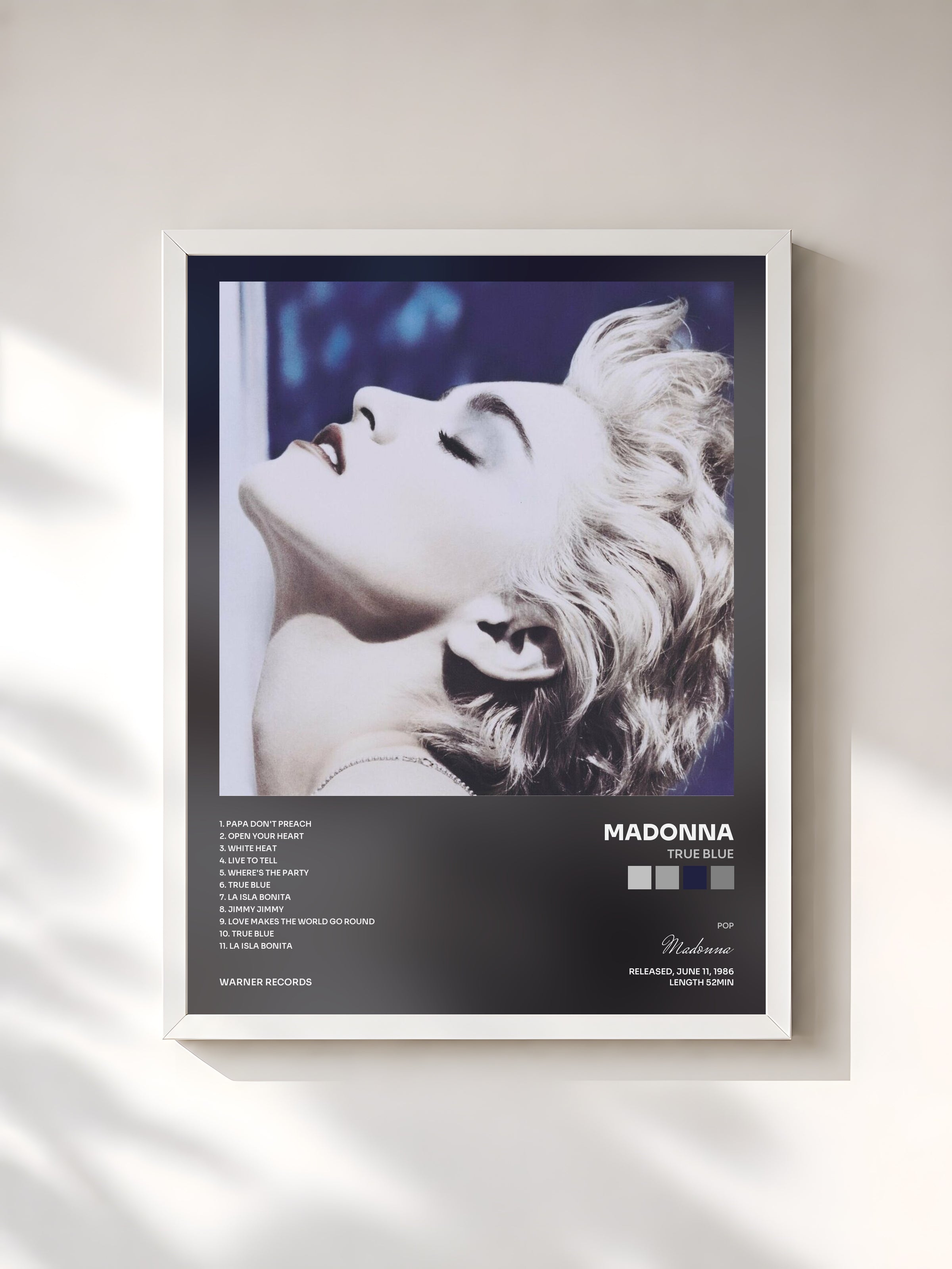 #blanc True Blue by Madonna as a framed art print, white frame, printed and framed in France